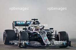 Race winner Lewis Hamilton (GBR) Mercedes AMG F1 W10 celebrates in parc ferme. 01.12.2019. Formula 1 World Championship, Rd 21, Abu Dhabi Grand Prix, Yas Marina Circuit, Abu Dhabi, Race Day.