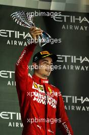 Charles Leclerc (MON) Ferrari celebrates his third position on the podium. 01.12.2019. Formula 1 World Championship, Rd 21, Abu Dhabi Grand Prix, Yas Marina Circuit, Abu Dhabi, Race Day.