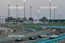 Robert Kubica (POL) Williams Racing FW42 and George Russell (GBR) Williams Racing FW42 at the start of the race as Pierre Gasly (FRA) Scuderia Toro Rosso STR14 runs wide. 01.12.2019. Formula 1 World Championship, Rd 21, Abu Dhabi Grand Prix, Yas Marina Circuit, Abu Dhabi, Race Day.
