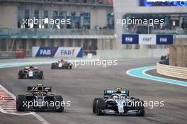 Valtteri Bottas (FIN) Mercedes AMG F1 W10 and Kevin Magnussen (DEN) Haas VF-19 battle for position. 01.12.2019. Formula 1 World Championship, Rd 21, Abu Dhabi Grand Prix, Yas Marina Circuit, Abu Dhabi, Race Day.