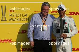 Lewis Hamilton (GBR) Mercedes AMG F1 W10 accepts the DHL Fastest Lap Award for 2019. 01.12.2019. Formula 1 World Championship, Rd 21, Abu Dhabi Grand Prix, Yas Marina Circuit, Abu Dhabi, Race Day.