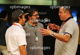 (L to R): Fernando Alonso (ESP) with Luis Garcia Abad (ESP) Driver Manager and Eric Boullier (FRA). 30.11.2019. Formula 1 World Championship, Rd 21, Abu Dhabi Grand Prix, Yas Marina Circuit, Abu Dhabi, Qualifying Day.