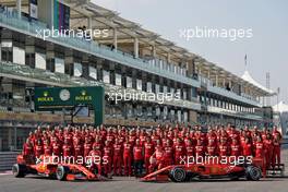 (L to R): Sebastian Vettel (GER) Ferrari and Charles Leclerc (MON) Ferrari at a team photograph. 30.11.2019. Formula 1 World Championship, Rd 21, Abu Dhabi Grand Prix, Yas Marina Circuit, Abu Dhabi, Qualifying Day.