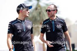 (L to R): George Russell (GBR) Williams Racing with team mate Robert Kubica (POL) Williams Racing. 30.11.2019. Formula 1 World Championship, Rd 21, Abu Dhabi Grand Prix, Yas Marina Circuit, Abu Dhabi, Qualifying Day.