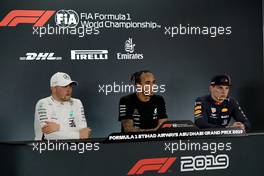 Qualifying top three in the FIA Press Conference (L to R): Valtteri Bottas (FIN) Mercedes AMG F1, second; Lewis Hamilton (GBR) Mercedes AMG F1, pole position; Max Verstappen (NLD) Red Bull Racing, third. 30.11.2019. Formula 1 World Championship, Rd 21, Abu Dhabi Grand Prix, Yas Marina Circuit, Abu Dhabi, Qualifying Day.