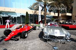 The 1982 Ferrari 126C2 driven by Patrick Tambay and a Mercedes-Benz 300 SL Gullwing on display in the paddock - Sotherby's.  30.11.2019. Formula 1 World Championship, Rd 21, Abu Dhabi Grand Prix, Yas Marina Circuit, Abu Dhabi, Qualifying Day.