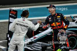 Lewis Hamilton (GBR) Mercedes AMG F1 in qualifying parc ferme with Max Verstappen (NLD) Red Bull Racing. 30.11.2019. Formula 1 World Championship, Rd 21, Abu Dhabi Grand Prix, Yas Marina Circuit, Abu Dhabi, Qualifying Day.