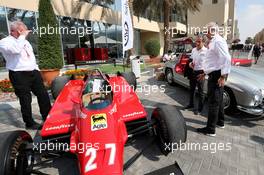 Alain Prost (FRA) Renault F1 Team Special Advisor and Jerome Stoll (FRA) Renault Sport F1 President with the 1982 Ferrari 126C2 driven by Patrick Tambay on display in the paddock - Sotherby's.  30.11.2019. Formula 1 World Championship, Rd 21, Abu Dhabi Grand Prix, Yas Marina Circuit, Abu Dhabi, Qualifying Day.