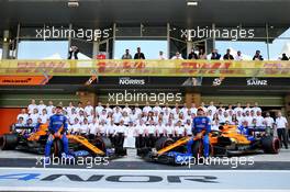 (L to R): Lando Norris (GBR) McLaren and Carlos Sainz Jr (ESP) McLaren at a team photograph. 01.12.2019. Formula 1 World Championship, Rd 21, Abu Dhabi Grand Prix, Yas Marina Circuit, Abu Dhabi, Race Day.