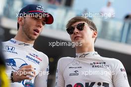 (L to R): Pierre Gasly (FRA) Scuderia Toro Rosso and George Russell (GBR) Williams Racing on the drivers parade. 01.12.2019. Formula 1 World Championship, Rd 21, Abu Dhabi Grand Prix, Yas Marina Circuit, Abu Dhabi, Race Day.