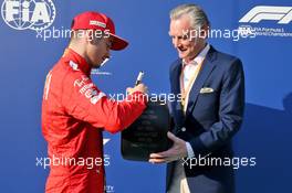 Charles Leclerc (MON) Ferrari with Sean Bratches (USA) Formula 1 Managing Director, Commercial Operations - Pirelli Pole Position Award. 01.12.2019. Formula 1 World Championship, Rd 21, Abu Dhabi Grand Prix, Yas Marina Circuit, Abu Dhabi, Race Day.