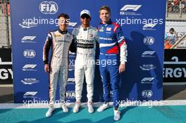 (L to R): Nyck De Vries (NLD) ART Grand Prix, F2 Champion; Lewis Hamilton (GBR) Mercedes AMG F1, F1 World Champion; Robert Shwartzman (RUS) Prema Racing, F3 Champion. 01.12.2019. Formula 1 World Championship, Rd 21, Abu Dhabi Grand Prix, Yas Marina Circuit, Abu Dhabi, Race Day.