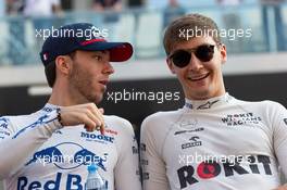 (L to R): Pierre Gasly (FRA) Scuderia Toro Rosso and George Russell (GBR) Williams Racing on the drivers parade. 01.12.2019. Formula 1 World Championship, Rd 21, Abu Dhabi Grand Prix, Yas Marina Circuit, Abu Dhabi, Race Day.