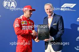 Charles Leclerc (MON) Ferrari with Sean Bratches (USA) Formula 1 Managing Director, Commercial Operations - Pirelli Pole Position Award. 01.12.2019. Formula 1 World Championship, Rd 21, Abu Dhabi Grand Prix, Yas Marina Circuit, Abu Dhabi, Race Day.