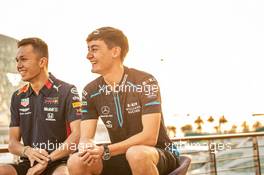 (L to R): Alexander Albon (THA) Red Bull Racing and George Russell (GBR) Williams Racing. 28.11.2019. Formula 1 World Championship, Rd 21, Abu Dhabi Grand Prix, Yas Marina Circuit, Abu Dhabi, Preparation Day.