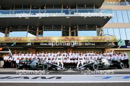 Lewis Hamilton (GBR) Mercedes AMG F1 and Valtteri Bottas (FIN) Mercedes AMG F1 at a team photograph. 28.11.2019. Formula 1 World Championship, Rd 21, Abu Dhabi Grand Prix, Yas Marina Circuit, Abu Dhabi, Preparation Day.