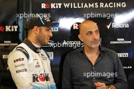 (L to R): Roy Nissany (ISR) Williams Racing Test Driver with his father Chanoch Nissany (ISR). 03.12.2019. Formula 1 Testing, Yas Marina Circuit, Abu Dhabi, Tuesday.