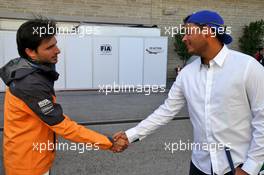(L to R): Carlos Sainz Jr (ESP) McLaren with Sebastian Munoz (COL) Golf Player. 01.11.2019. Formula 1 World Championship, Rd 19, United States Grand Prix, Austin, Texas, USA, Practice Day.