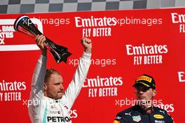 (L to R): race winner Valtteri Bottas (FIN) Mercedes AMG F1 and Max Verstappen (NLD) Red Bull Racing on the podium.                                03.11.2019. Formula 1 World Championship, Rd 19, United States Grand Prix, Austin, Texas, USA, Race Day.