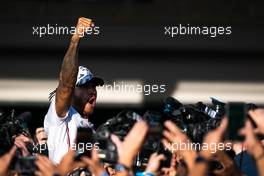 Lewis Hamilton (GBR) Mercedes AMG F1 celebrates his second position and World Championship with the team. 03.11.2019. Formula 1 World Championship, Rd 19, United States Grand Prix, Austin, Texas, USA, Race Day.