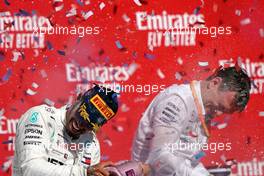 Lewis Hamilton (GBR) Mercedes AMG F1 celebrates his second position and World Championship on the podium with James Allison (GBR) Mercedes AMG F1 Technical Director. 03.11.2019. Formula 1 World Championship, Rd 19, United States Grand Prix, Austin, Texas, USA, Race Day.
