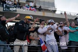 Lewis Hamilton (GBR) Mercedes AMG F1 celebrates his second position and World Championship with fans.     03.11.2019. Formula 1 World Championship, Rd 19, United States Grand Prix, Austin, Texas, USA, Race Day.