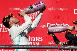 Race winner Valtteri Bottas (FIN) Mercedes AMG F1 celebrates on the podium with third placed Lewis Hamilton (GBR) Mercedes AMG F1. 03.11.2019. Formula 1 World Championship, Rd 19, United States Grand Prix, Austin, Texas, USA, Race Day.