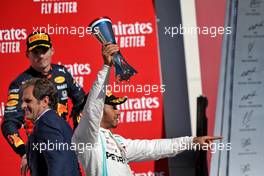 Lewis Hamilton (GBR) Mercedes AMG F1 celebrates his second position and World Championship on the podium.                                03.11.2019. Formula 1 World Championship, Rd 19, United States Grand Prix, Austin, Texas, USA, Race Day.