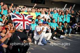 Lewis Hamilton (GBR) Mercedes AMG F1 celebrates his second position and World Championship with Valtteri Bottas (FIN) Mercedes AMG F1, his family, and the team.                                03.11.2019. Formula 1 World Championship, Rd 19, United States Grand Prix, Austin, Texas, USA, Race Day.