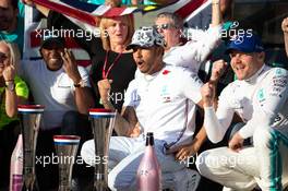 Lewis Hamilton (GBR) Mercedes AMG F1 celebrates his second position and World Championship with race winner Valtteri Bottas (FIN) Mercedes AMG F1 and the team. 03.11.2019. Formula 1 World Championship, Rd 19, United States Grand Prix, Austin, Texas, USA, Race Day.