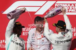 2nd place and new world champion Lewis Hamilton (GBR) Mercedes AMG F1 W10 with James Allison (GBR) Mercedes AMG F1 Technical Director, 1st place Valtteri Bottas (FIN) Mercedes AMG F1 W10. 03.11.2019. Formula 1 World Championship, Rd 19, United States Grand Prix, Austin, Texas, USA, Race Day.