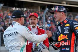 Valtteri Bottas (FIN) Mercedes AMG F1 celebrates his pole position in qualifying parc ferme with Sebastian Vettel (GER) Ferrari and Max Verstappen (NLD) Red Bull Racing. 02.11.2019. Formula 1 World Championship, Rd 19, United States Grand Prix, Austin, Texas, USA, Qualifying Day.