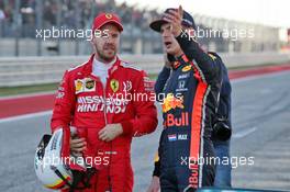 (L to R): Sebastian Vettel (GER) Ferrari with Max Verstappen (NLD) Red Bull Racing in qualifying parc ferme. 02.11.2019. Formula 1 World Championship, Rd 19, United States Grand Prix, Austin, Texas, USA, Qualifying Day.