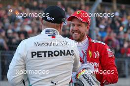 Valtteri Bottas (FIN) Mercedes AMG F1 celebrates his pole position in qualifying parc ferme with Sebastian Vettel (GER) Ferrari. 02.11.2019. Formula 1 World Championship, Rd 19, United States Grand Prix, Austin, Texas, USA, Qualifying Day.