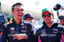 (L to R): Alexander Albon (THA) Red Bull Racing with Sergio Perez (MEX) Racing Point F1 Team on the drivers parade. 03.11.2019. Formula 1 World Championship, Rd 19, United States Grand Prix, Austin, Texas, USA, Race Day.