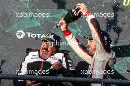 Race winner Fernando Alonso (ESP) Toyota Gazoo Racing celebrates on the podium with Rob Leupen (NDL) Toyota Gazoo Racing Director of Business Operations. 04.05.2019. FIA World Endurance Championship, Round 7, Spa-Francorchamps, Belgium, Saturday.