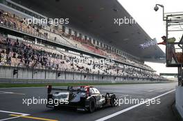 Race winners Gustavo Menezes (USA) / Norman Nato (FRA) / Bruno Senna (BRA) #01 Rebellion Racing, Rebellion R13 - Gibson take the chequered flag at the end of the race. 10.11.2019. FIA World Endurance Championship, Round 3, Four Hours of Shanghai, Shanghai, China, Sunday.