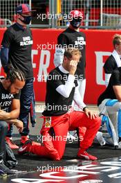 Sebastian Vettel (GER) Ferrari on the grid. 09.08.2020. Formula 1 World Championship, Rd 5, 70th Anniversary Grand Prix, Silverstone, England, Race Day.