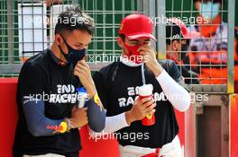 (L to R): Alexander Albon (THA) Red Bull Racing and Charles Leclerc (MON) Ferrari on the grid. 09.08.2020. Formula 1 World Championship, Rd 5, 70th Anniversary Grand Prix, Silverstone, England, Race Day.