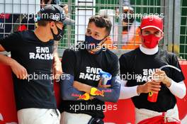 (L to R): George Russell (GBR) Williams Racing; Alexander Albon (THA) Red Bull Racing; and Charles Leclerc (MON) Ferrari, on the grid. 09.08.2020. Formula 1 World Championship, Rd 5, 70th Anniversary Grand Prix, Silverstone, England, Race Day.