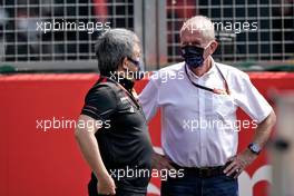 (L to R): Masashi Yamamoto (JPN) Honda Racing F1 Managing Director with Dr Helmut Marko (AUT) Red Bull Motorsport Consultant on the grid. 09.08.2020. Formula 1 World Championship, Rd 5, 70th Anniversary Grand Prix, Silverstone, England, Race Day.