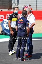(L to R): Cyril Abiteboul (FRA) Renault Sport F1 Managing Director with Christian Horner (GBR) Red Bull Racing Team Principal and Dr Helmut Marko (AUT) Red Bull Motorsport Consultant on the grid. 09.08.2020. Formula 1 World Championship, Rd 5, 70th Anniversary Grand Prix, Silverstone, England, Race Day.