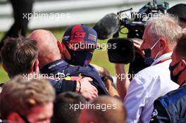 Race winner Max Verstappen (NLD) Red Bull Racing celebrates with the team in parc ferme. 09.08.2020. Formula 1 World Championship, Rd 5, 70th Anniversary Grand Prix, Silverstone, England, Race Day.
