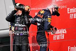 (L to R): Lewis Hamilton (GBR) Mercedes AMG F1 celebrates his second position on the podium with race winner Max Verstappen (NLD) Red Bull Racing. 09.08.2020. Formula 1 World Championship, Rd 5, 70th Anniversary Grand Prix, Silverstone, England, Race Day.