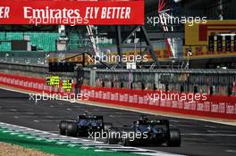 Valtteri Bottas (FIN) Mercedes AMG F1 W11 leads team mate Lewis Hamilton (GBR) Mercedes AMG F1 W11. 09.08.2020. Formula 1 World Championship, Rd 5, 70th Anniversary Grand Prix, Silverstone, England, Race Day.