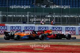 Alexander Albon (THA) Red Bull Racing RB16 and Lando Norris (GBR) McLaren MCL35 battle for position. 09.08.2020. Formula 1 World Championship, Rd 5, 70th Anniversary Grand Prix, Silverstone, England, Race Day.
