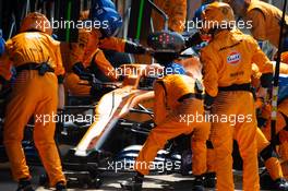 Lando Norris (GBR) McLaren MCL35 makes a pit stop. 09.08.2020. Formula 1 World Championship, Rd 5, 70th Anniversary Grand Prix, Silverstone, England, Race Day.