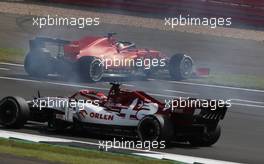 Sebastian Vettel (GER) Ferrari SF1000 spins at the start of the race, avoided by Kimi Raikkonen (FIN) Alfa Romeo Racing C39. 09.08.2020. Formula 1 World Championship, Rd 5, 70th Anniversary Grand Prix, Silverstone, England, Race Day.