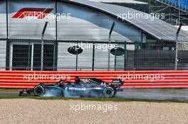 Lewis Hamilton (GBR) Mercedes AMG F1 W11 locks up under braking entering the pits. 09.08.2020. Formula 1 World Championship, Rd 5, 70th Anniversary Grand Prix, Silverstone, England, Race Day.