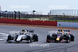 Pierre Gasly (FRA) AlphaTauri AT01 and Alexander Albon (THA) Red Bull Racing RB16 battle for position. 09.08.2020. Formula 1 World Championship, Rd 5, 70th Anniversary Grand Prix, Silverstone, England, Race Day.
